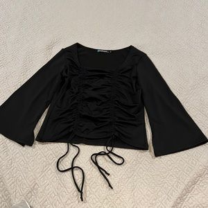 Black adjustable cinched front top.